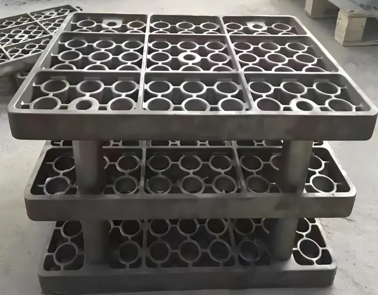 How Do Base Trays Interact with Other Equipment in Heat Treatment?